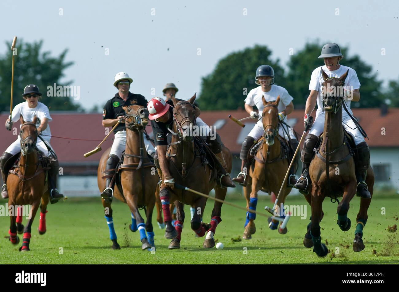Polo players jostling for the ball during the Berenberg High Goal Trophy 2008 polo tournament in Thann, Holzkirchen, Bavaria, G Stock Photo