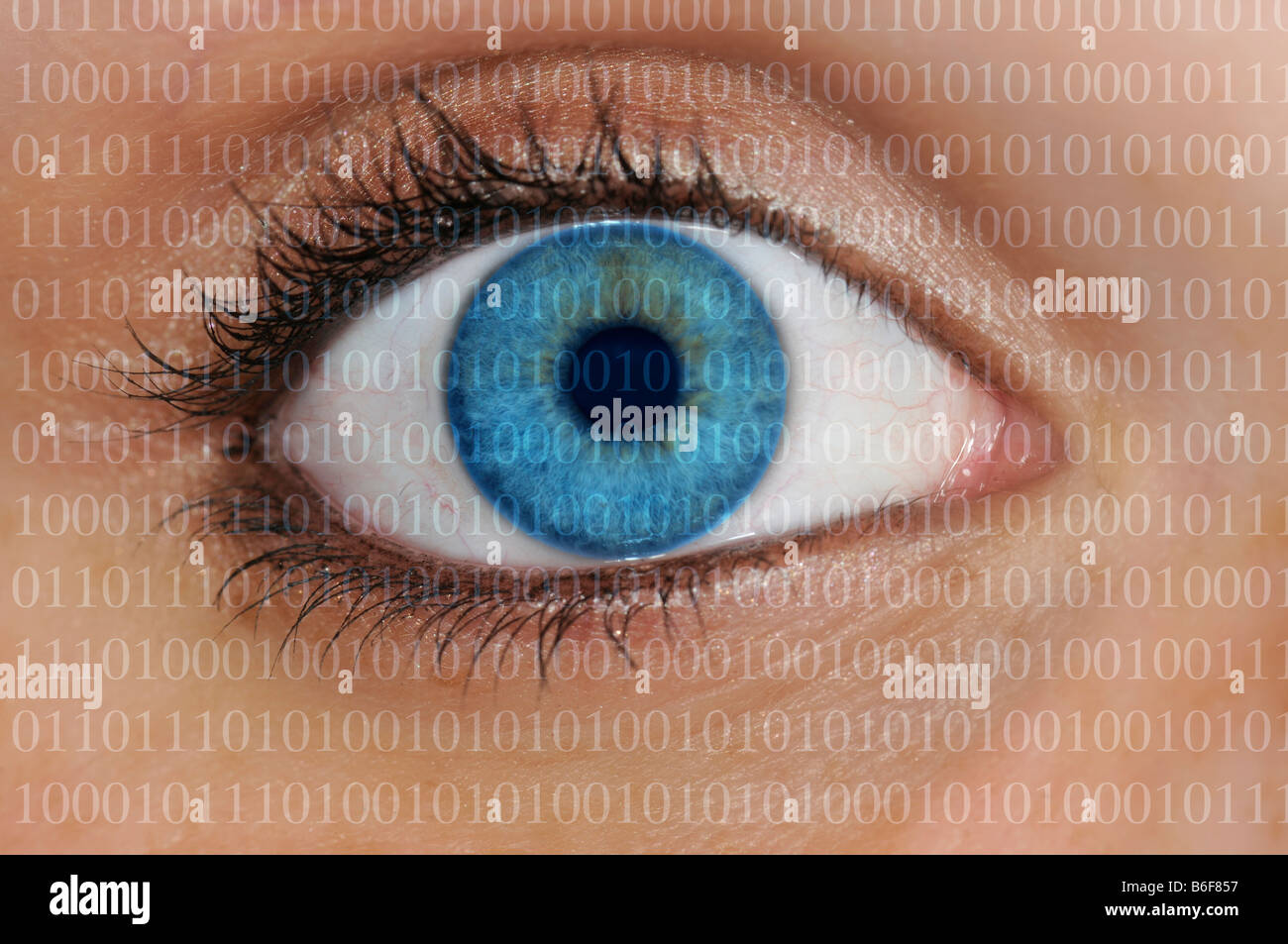 Close-up of binary code covering an eye with a light blue iris, symbolizing the collection of personal data Stock Photo