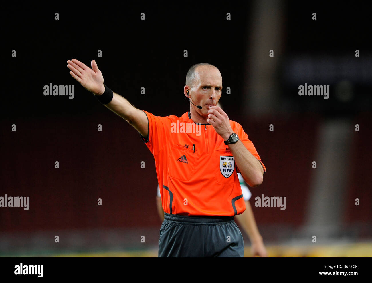 FIFA referee Michael Leslie DEAN, England, blowing whistle and gesticulating Stock Photo