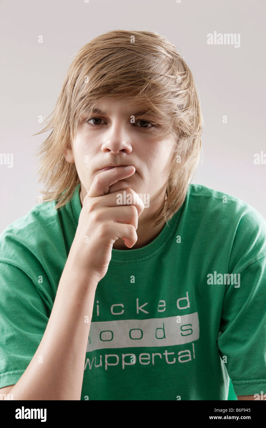 13 yearold boy wearing a green tshirt Stock Photo Alamy