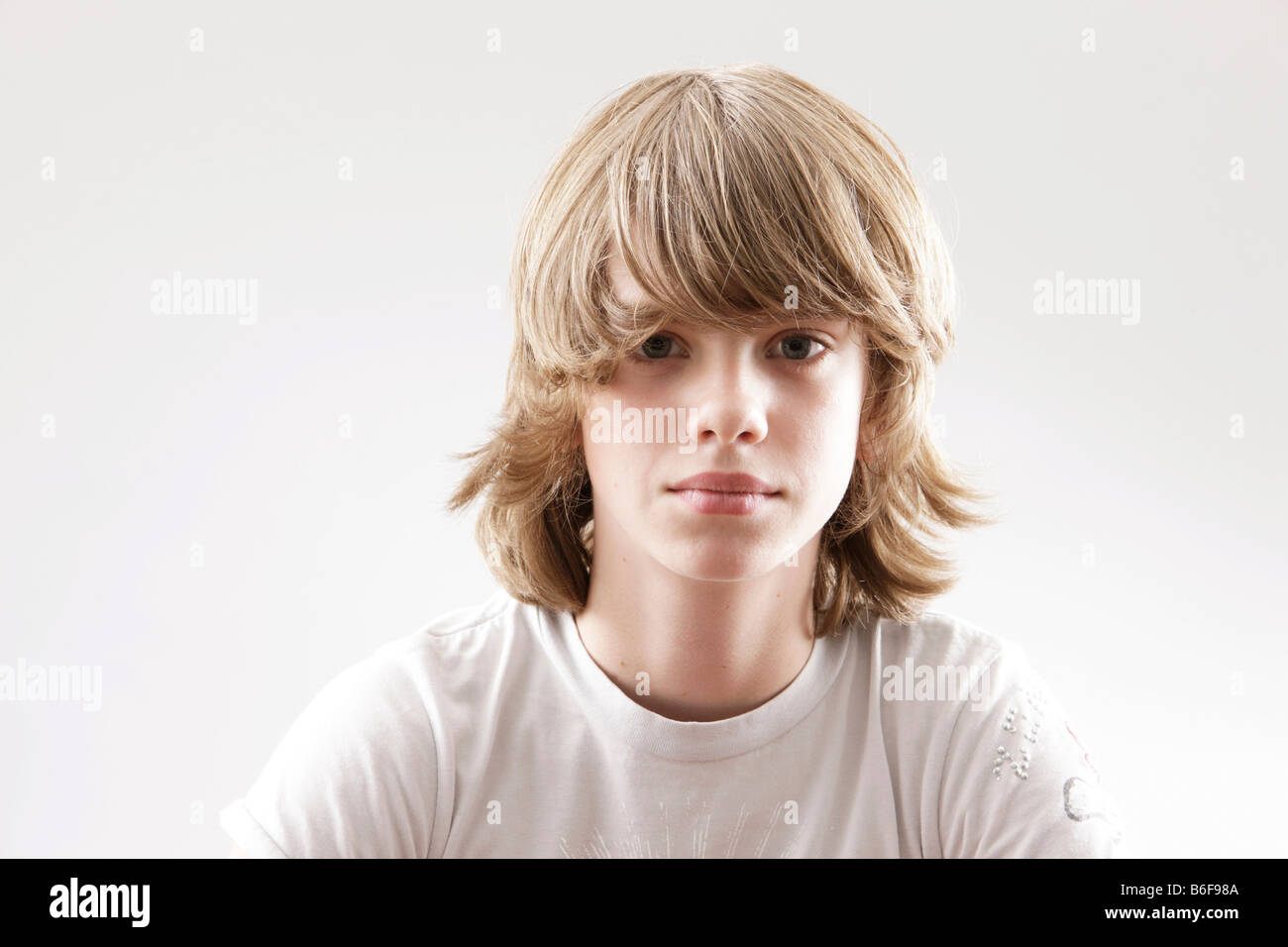 12 year-old boy looking into the camera Stock Photo