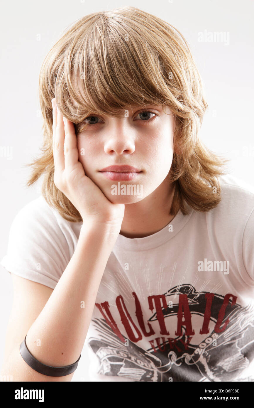 12 year-old boy looking into the camera Stock Photo 