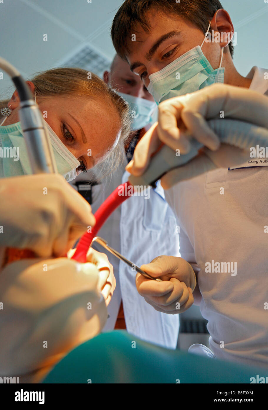 Students practice the extraction of a wisdom tooth on a dummy at the Zahnklinik der Eberhard-Karls-Universitaet or Dental Clini Stock Photo