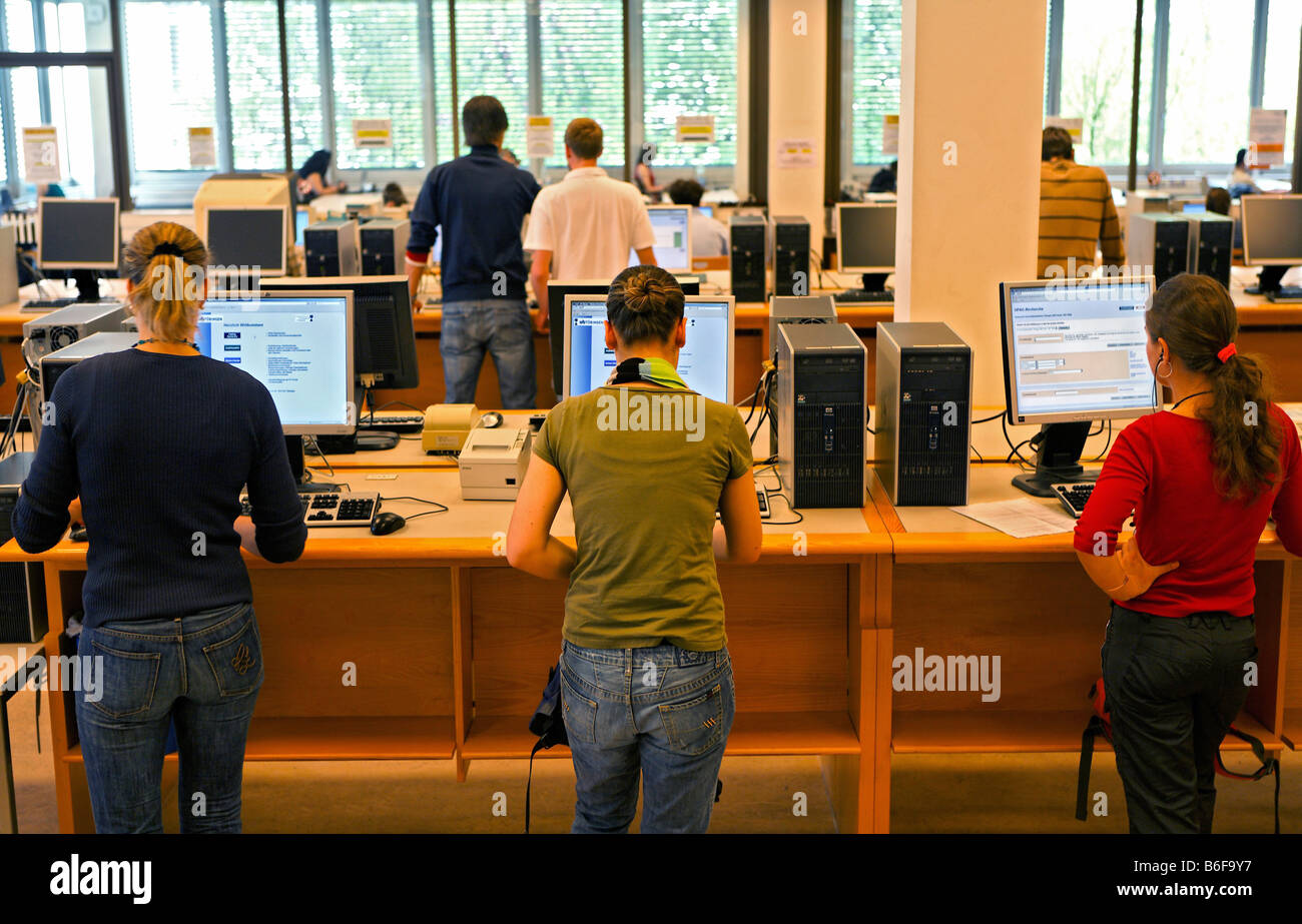 Students using computers for research at the Eberhard-Karls University Library in Tuebingen, Baden-Wuerttemberg, Germany, Europe Stock Photo