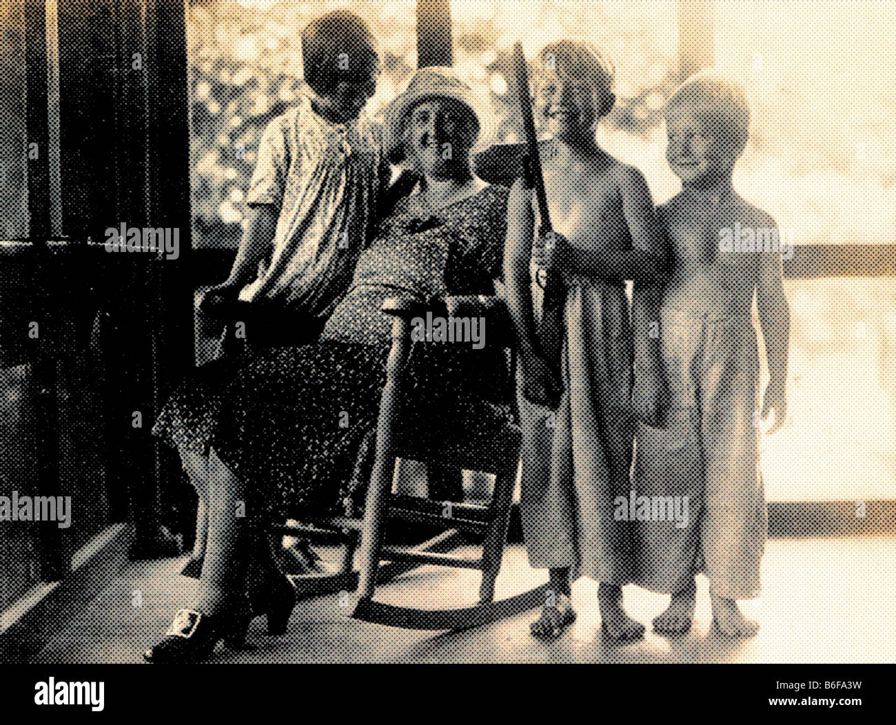 old photograph of grandmother and grandchildren circa 1930 Stock Photo