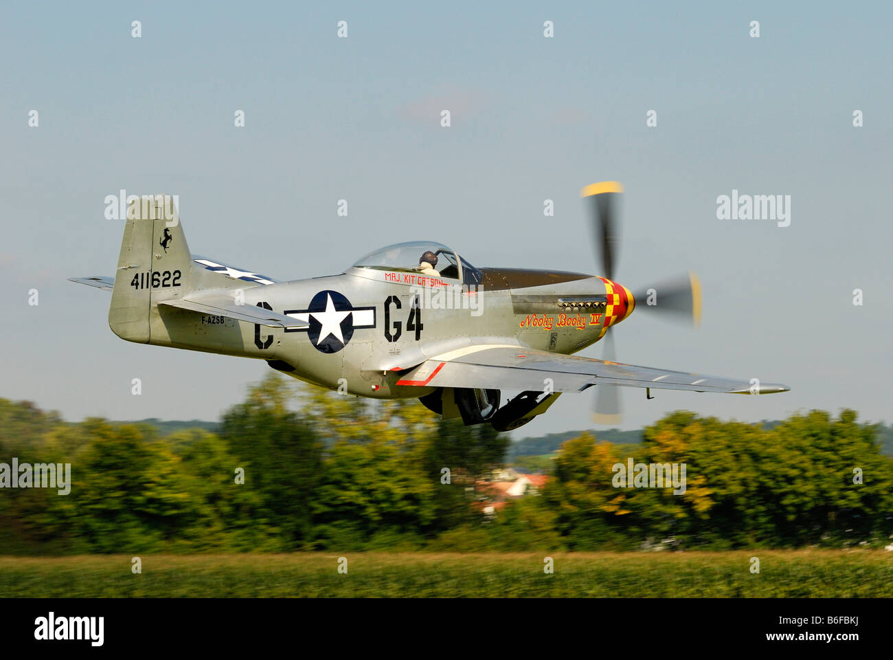 Legendary American fighter aircraft, North American P-51 Mustang, shortly after take-off Stock Photo