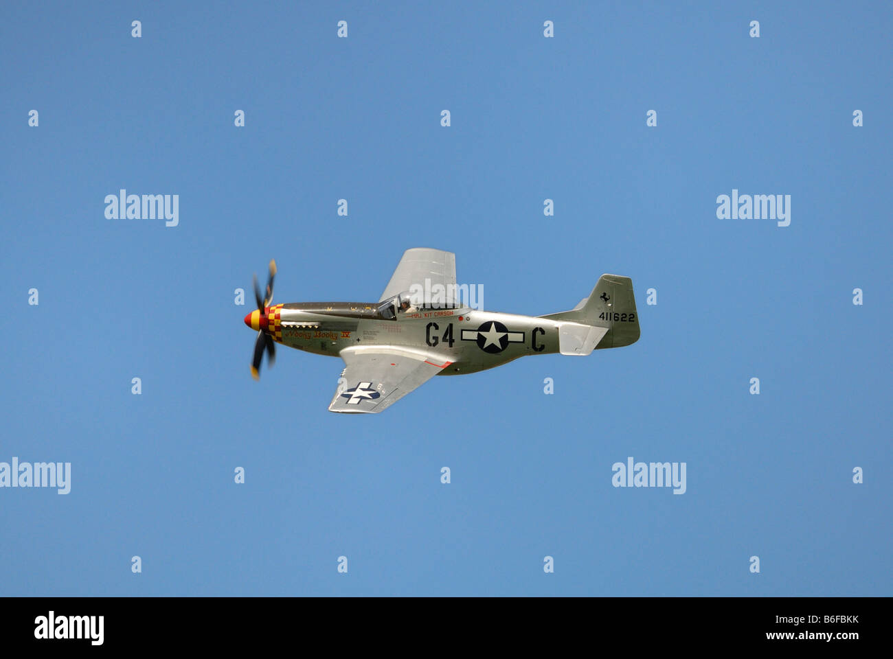 Legendary American fighter aircraft, North American P-51 Mustang, flying by at low-altitude Stock Photo