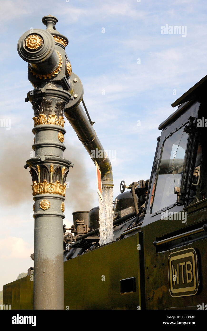 Steam train filling water hires stock photography and images Alamy