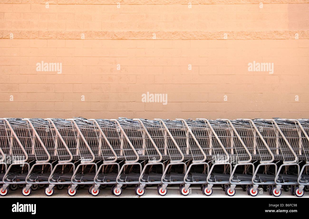 Gray shopping trollies in front of a wall, Newton, New Jersey, USA Stock Photo