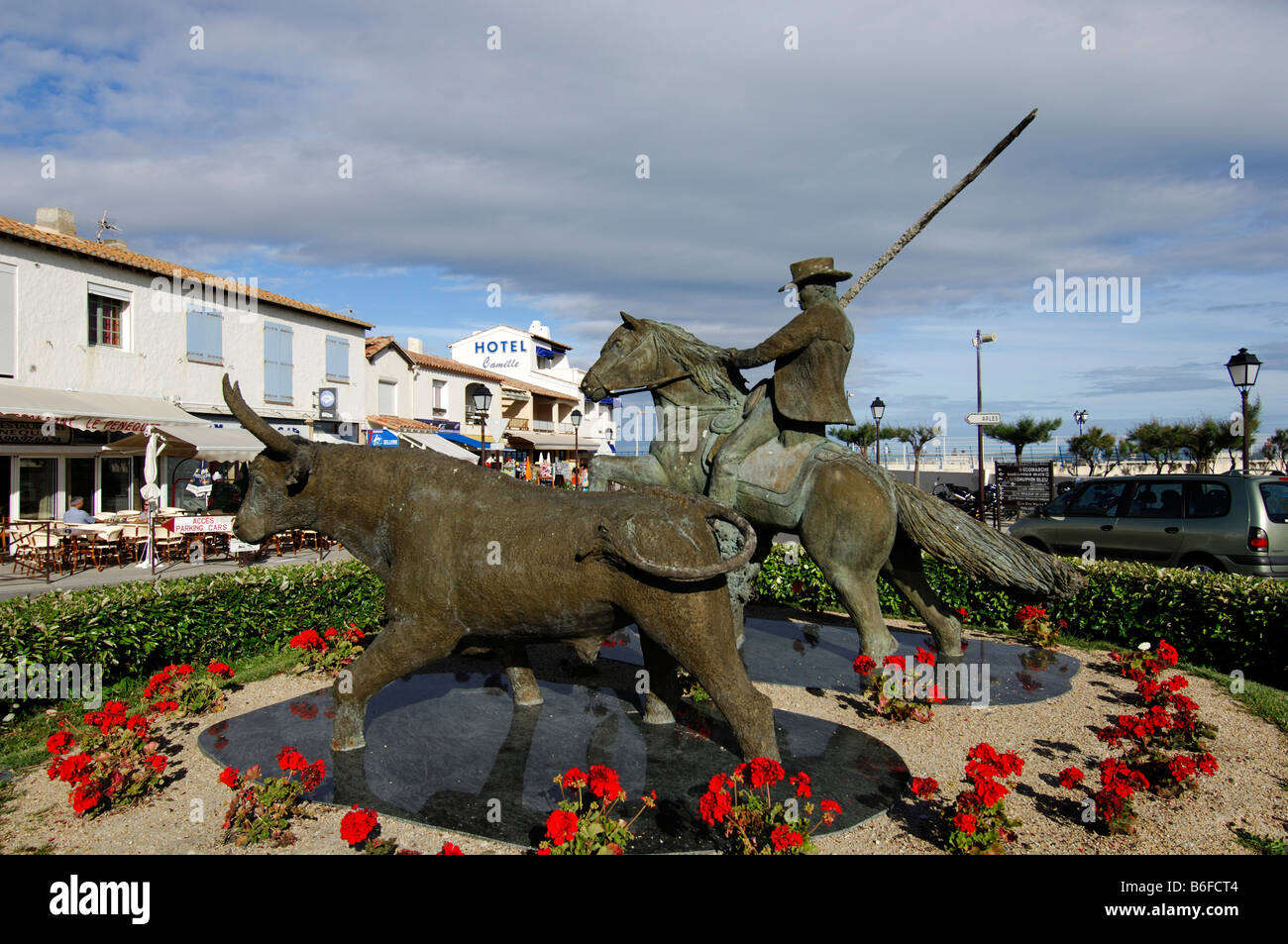 Bull fighting, bronze statue in Saintes Maries de la Mer, La Camargue, Provence, France, Europe Stock Photo