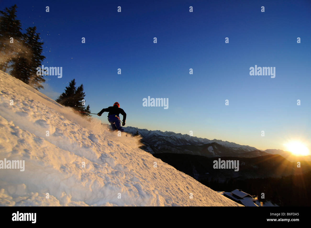 Skier skiing down the Florihang, Brauneck, Bayrische Alpen or Bavarian Alps, Bavaria, Germany, Europe Stock Photo