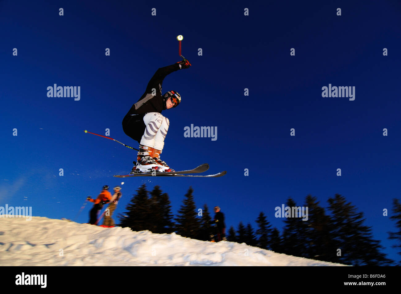 Skier skiing down the Florihang, Brauneck, Bayrische Alpen or Bavarian Alps, Bavaria, Germany, Europe Stock Photo
