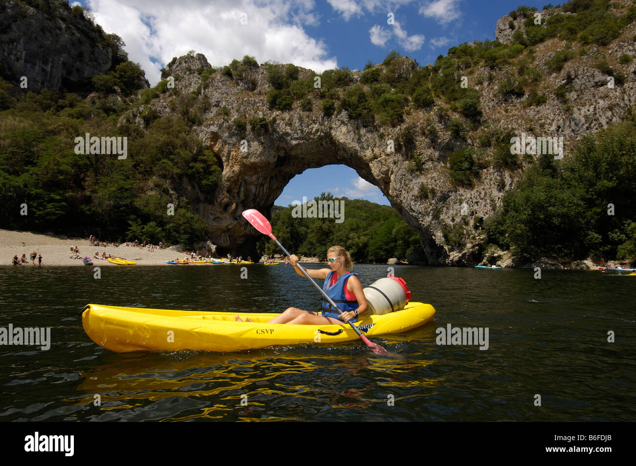 Kayak paddling past the natural rock arch, Vallon Pont d'Arc, on the  Ardeche River, Ardeche, Rhone Alps, France, Europe Stock Photo - Alamy