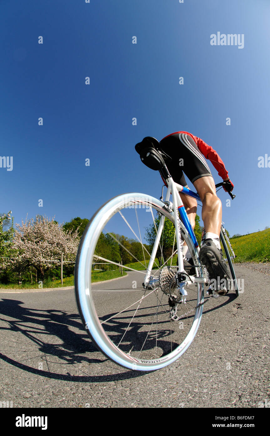 Racing cyclists riding, Samerberg, Chiemgau, Bavaria, Germany, Europe Stock Photo