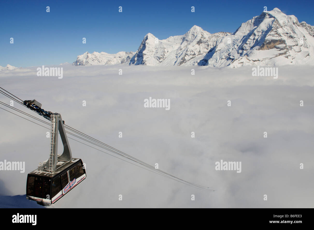 Cable car of the Schilthorn Cableway, view from Mt Schilthorn, Piz Gloria on the Eiger, Moench, Jungfrau, Grindelwald, Bernese  Stock Photo