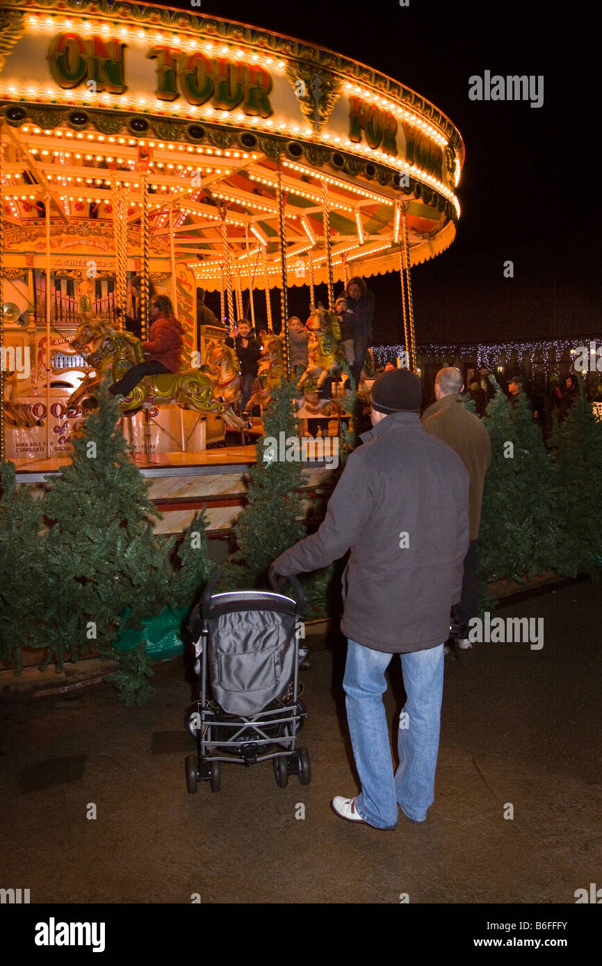UK Cheshire Chester Zoo Frost Fair children enjoying ride on