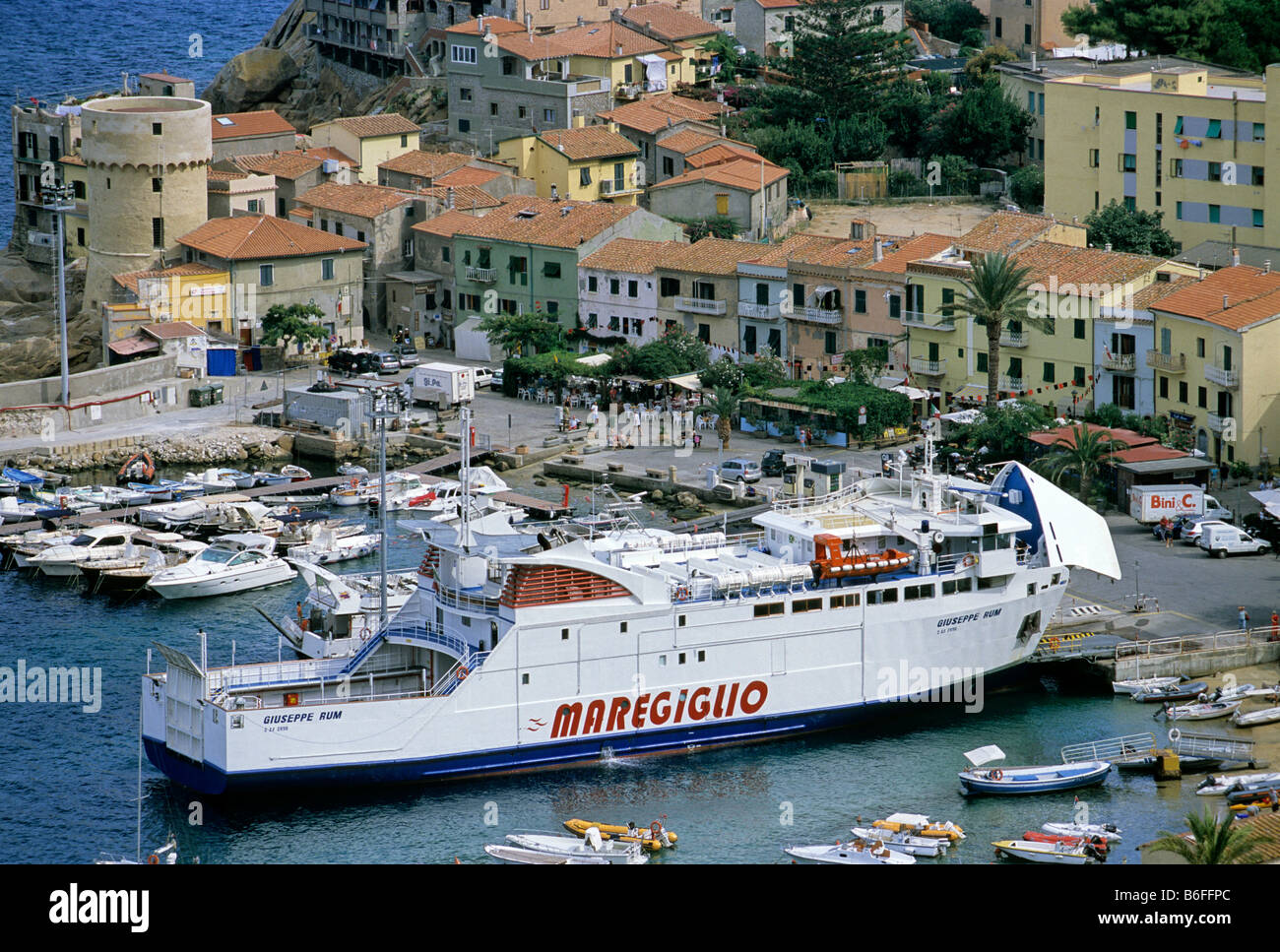 Ferryboat in the harbour of Giglio Porto, Isola del Giglio, province of Grosseto, Tuscany, Italy, Europe Stock Photo