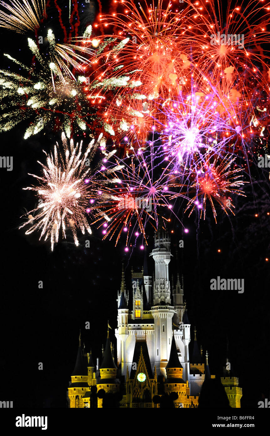 Disney World Magic Kingdom with Fireworks at night Stock Photo