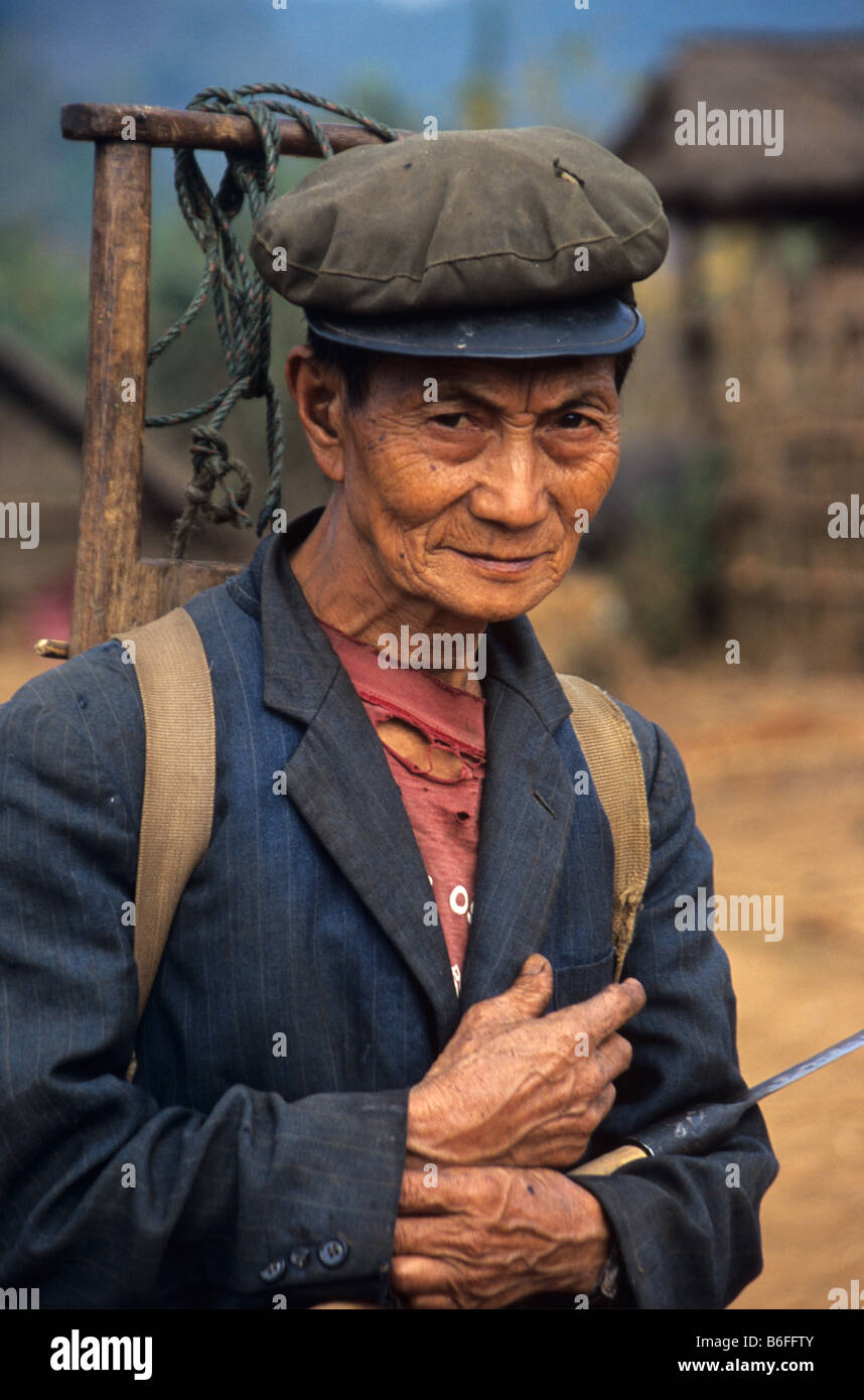 Portrait of old Hmong woodcutter near Phonsavan, Xiang Khuang Province, Laos Stock Photo