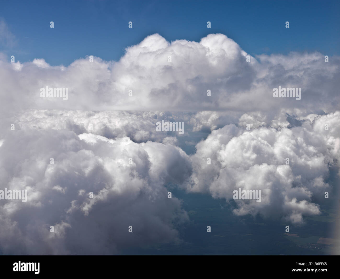 Blue sky above the clouds Stock Photo