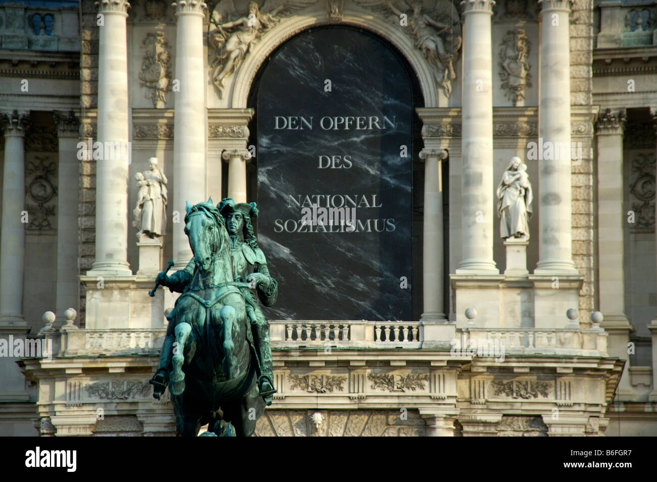 Hofburg with an equestrian statue and the inscription Den Opfern des Nationalsozialismus, To the Victims of National Socialism, Stock Photo