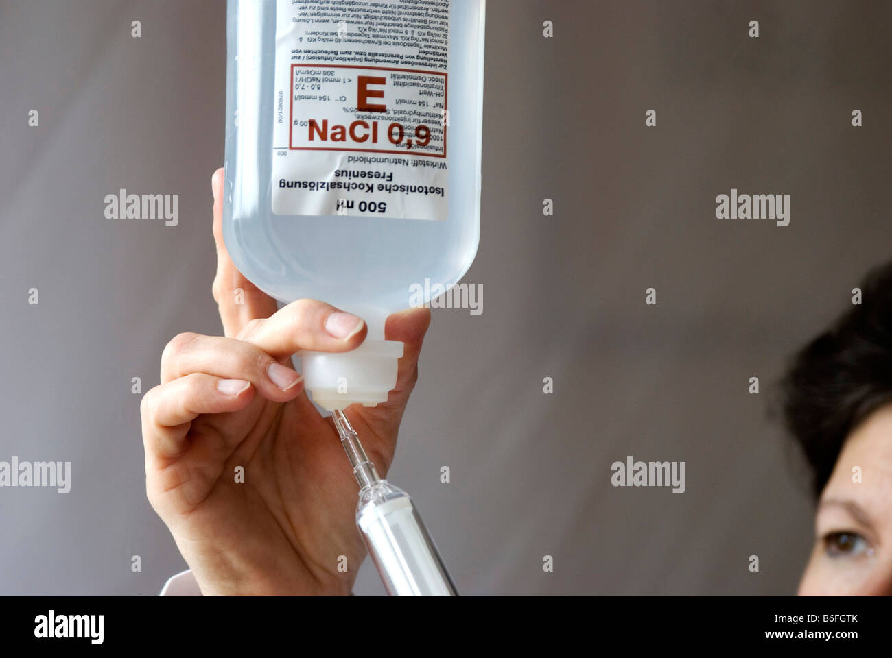 Doctor Preparing An Infusion Stock Photo Alamy