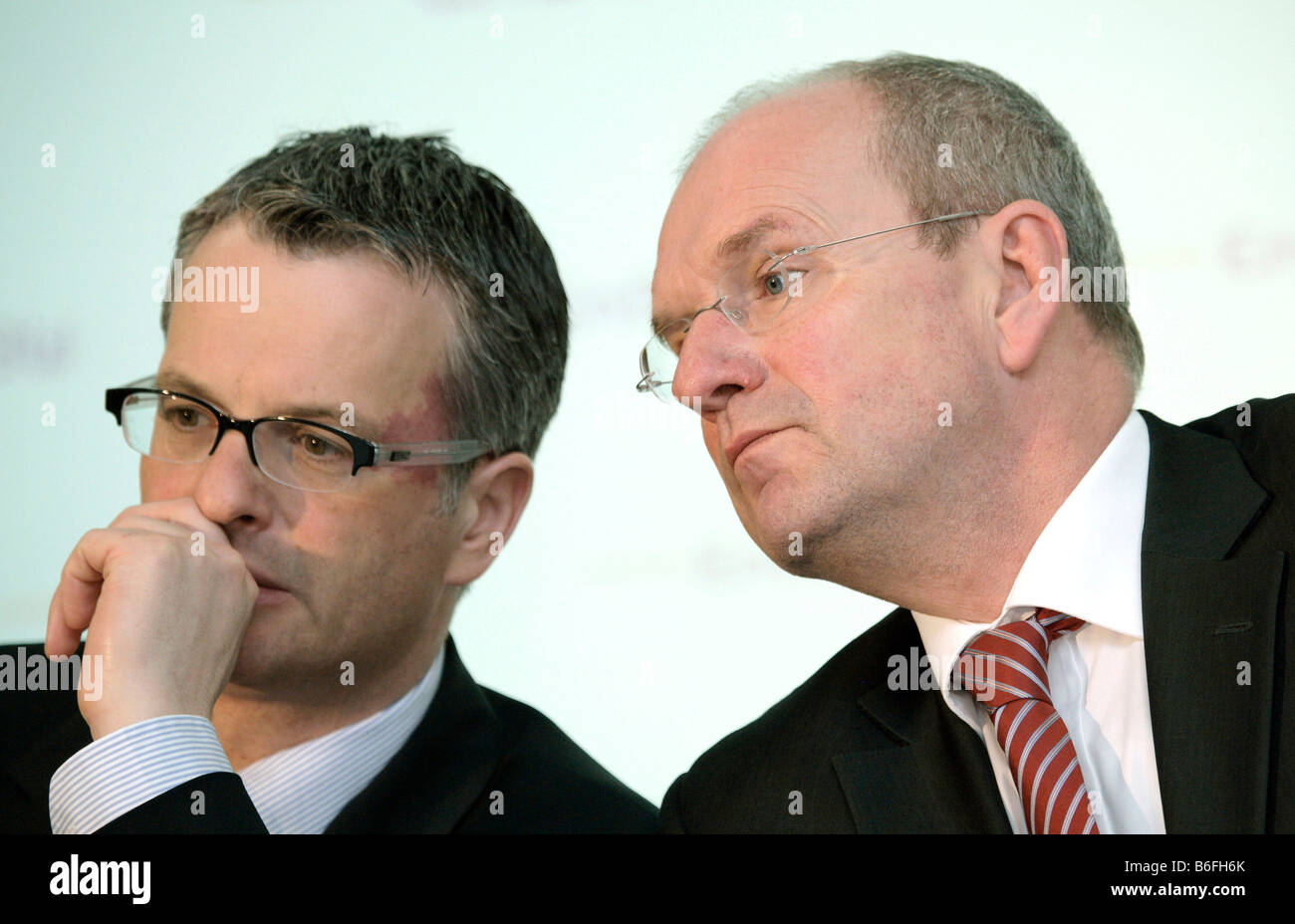 Hans-Peter Villis, chief executive of EnBW Energie Baden-Wuerttemberg AG, and Christian Holzherr, left, finance executive board Stock Photo