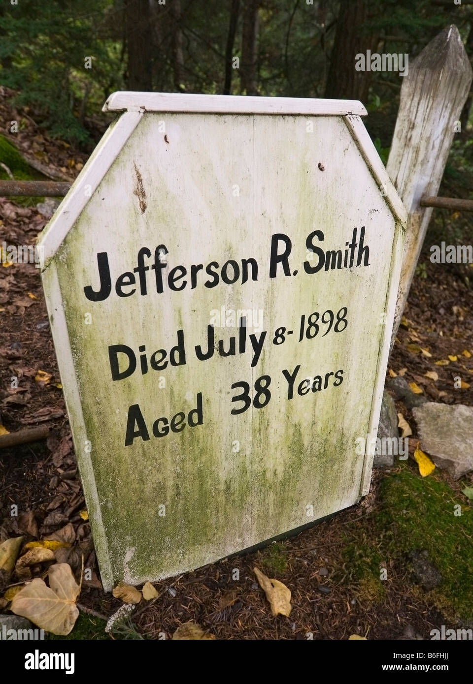 Grave and tombstone of Soapy Smith, most famous gangster in Klondike Gold Rush, Gold Rush Cemetery, Skagway, Alaska, USA Stock Photo