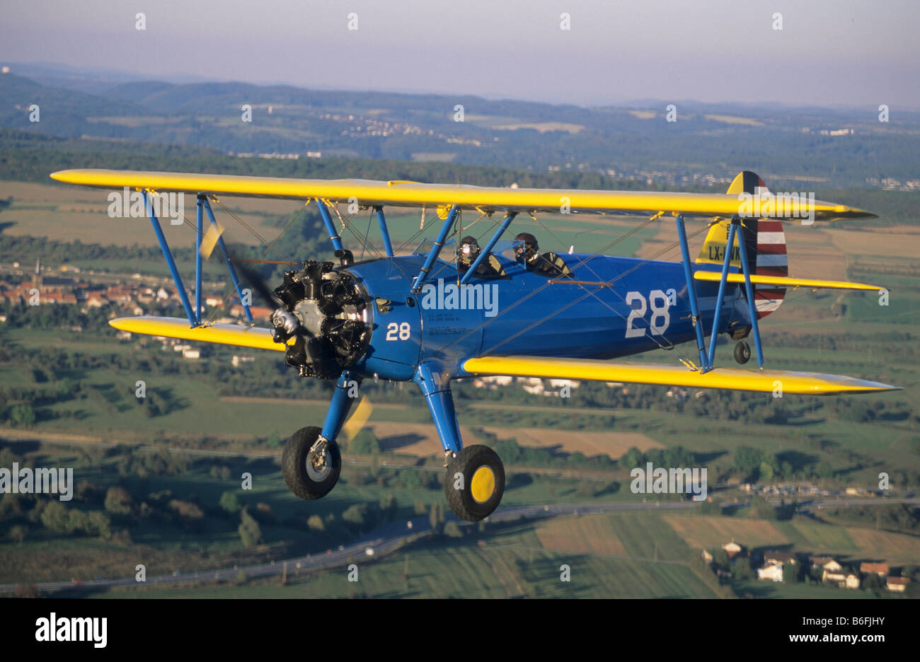 Old american trainer biplane Boeing PT-17 Kaydet / Stearman model 75 in flight Stock Photo