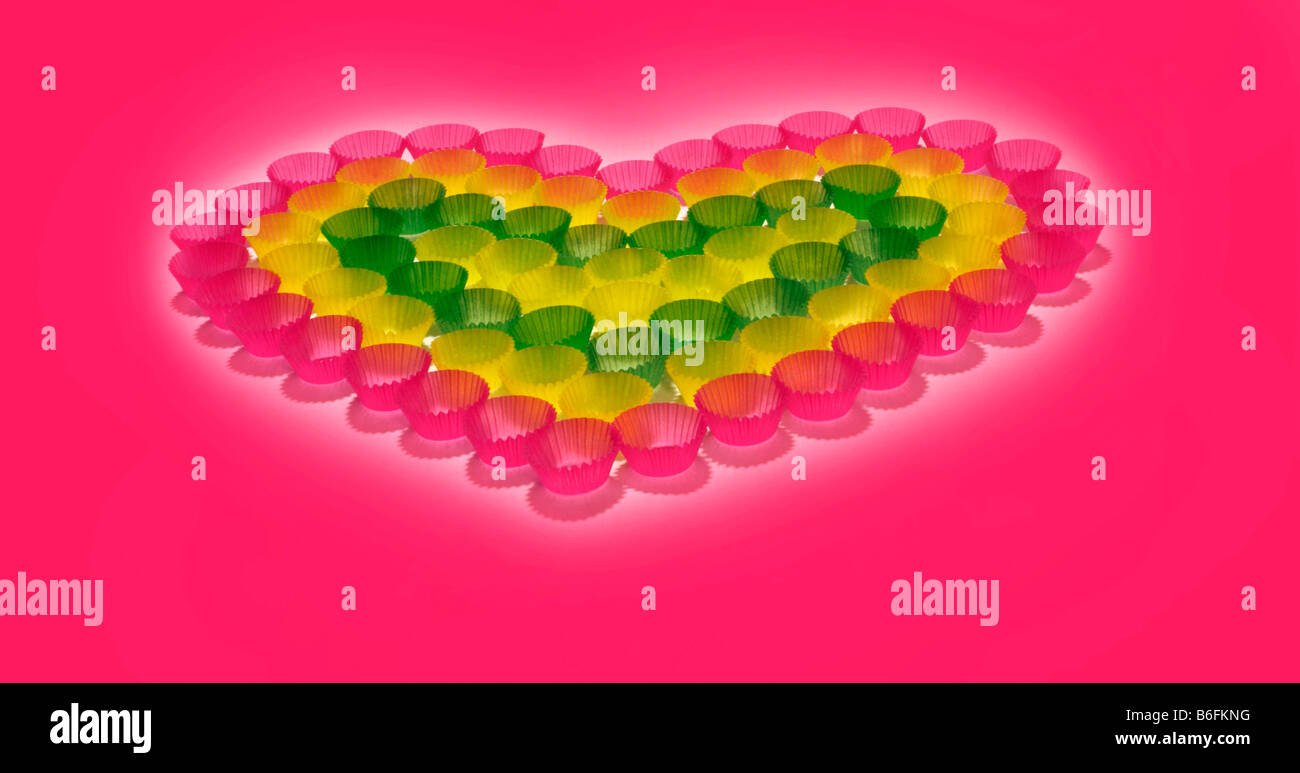Confectionary cups formed in a heart shape Stock Photo