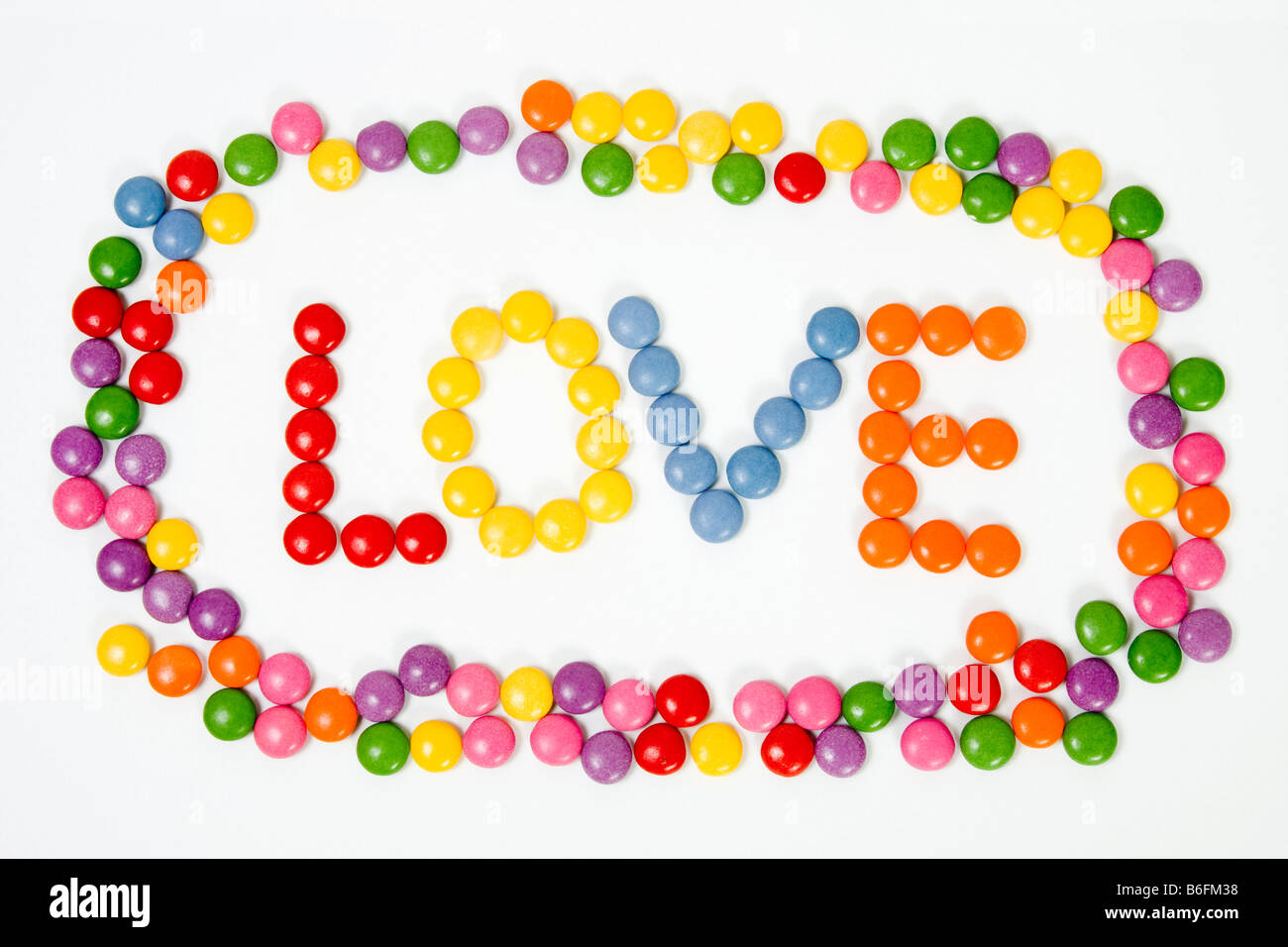 Coloured confectionary forming the word LOVE Stock Photo - Alamy