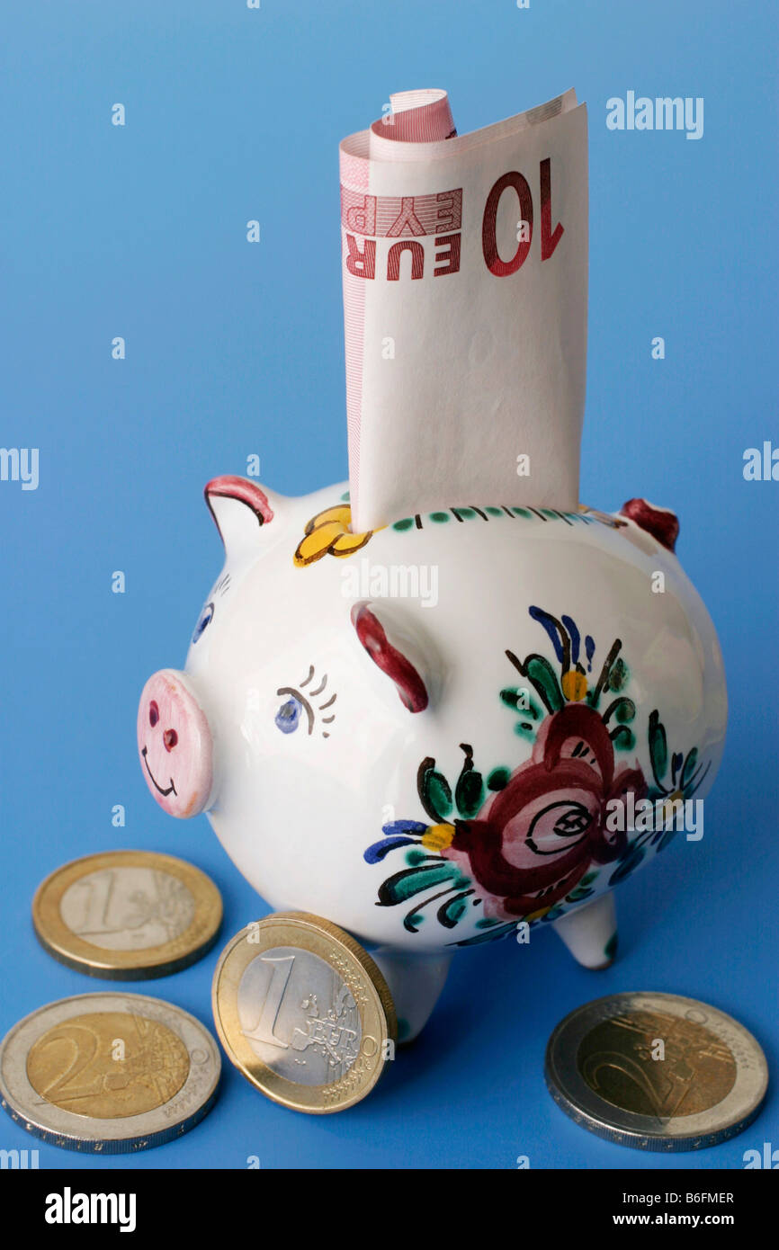 Euros and piggy bank Stock Photo