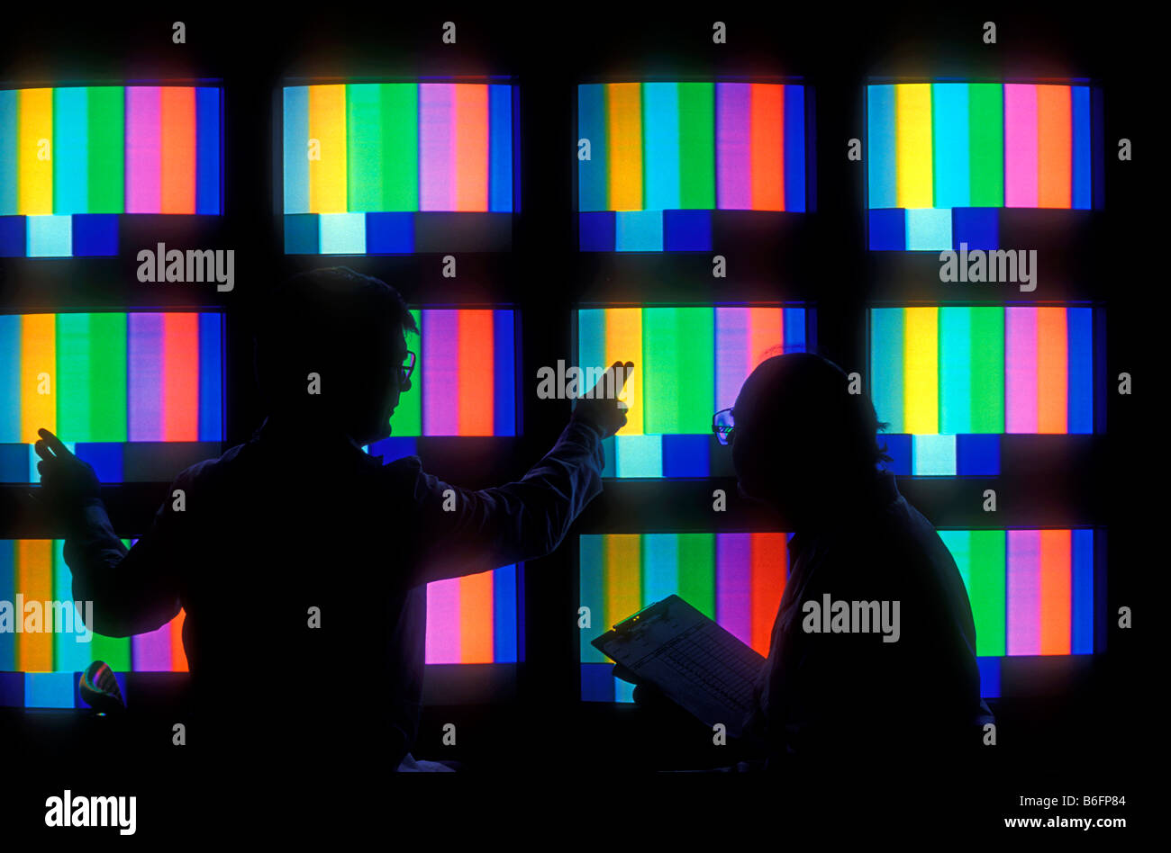 Communication Inspector video broadcast technicians communications inspection Stock Photo - Alamy