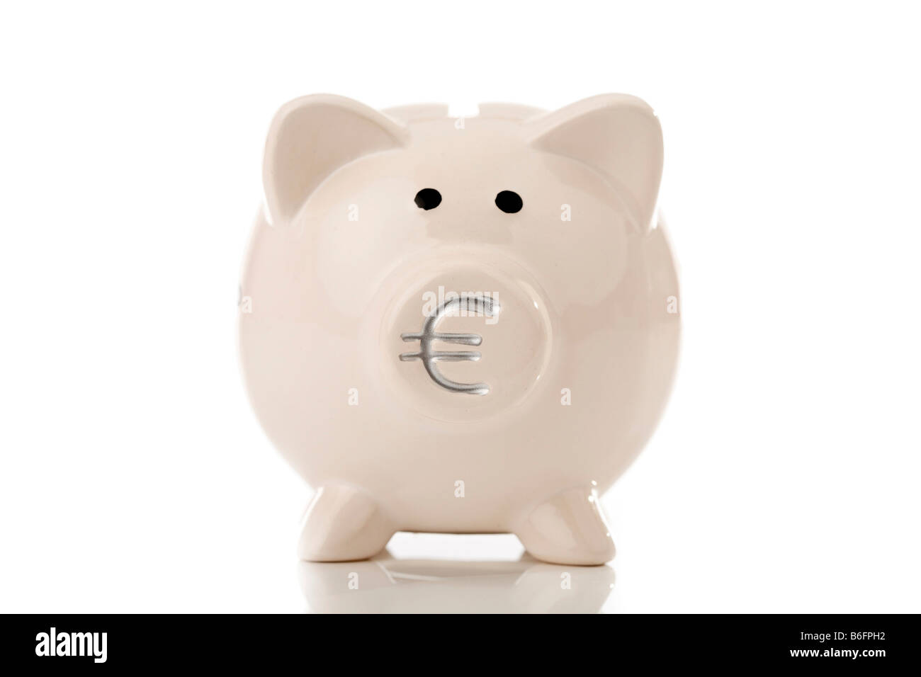 Piggy bank with a Ae or EURO sign on its snout Stock Photo