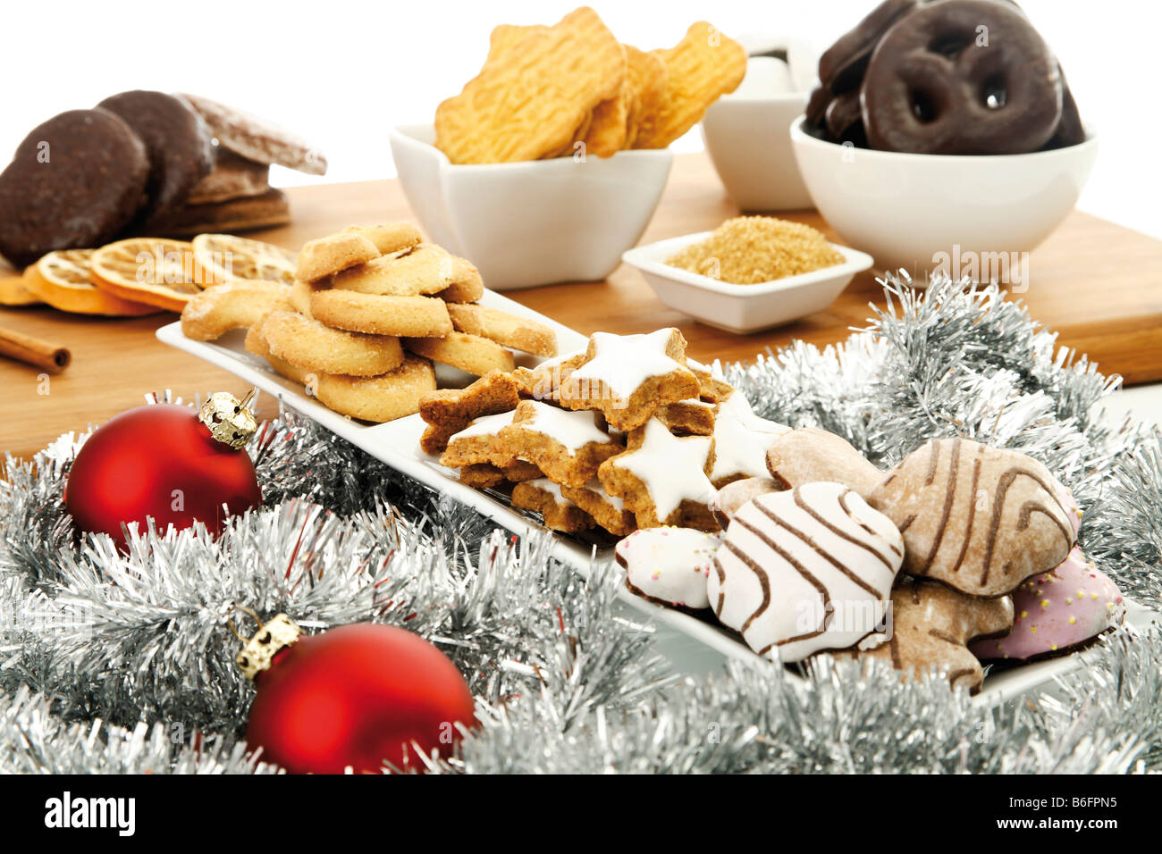 Assortment of christmas biscuits, cinnamon star-shaped biscuits, gingerbread, vanilla biscuits, chocolate gingerbread, spiced b Stock Photo