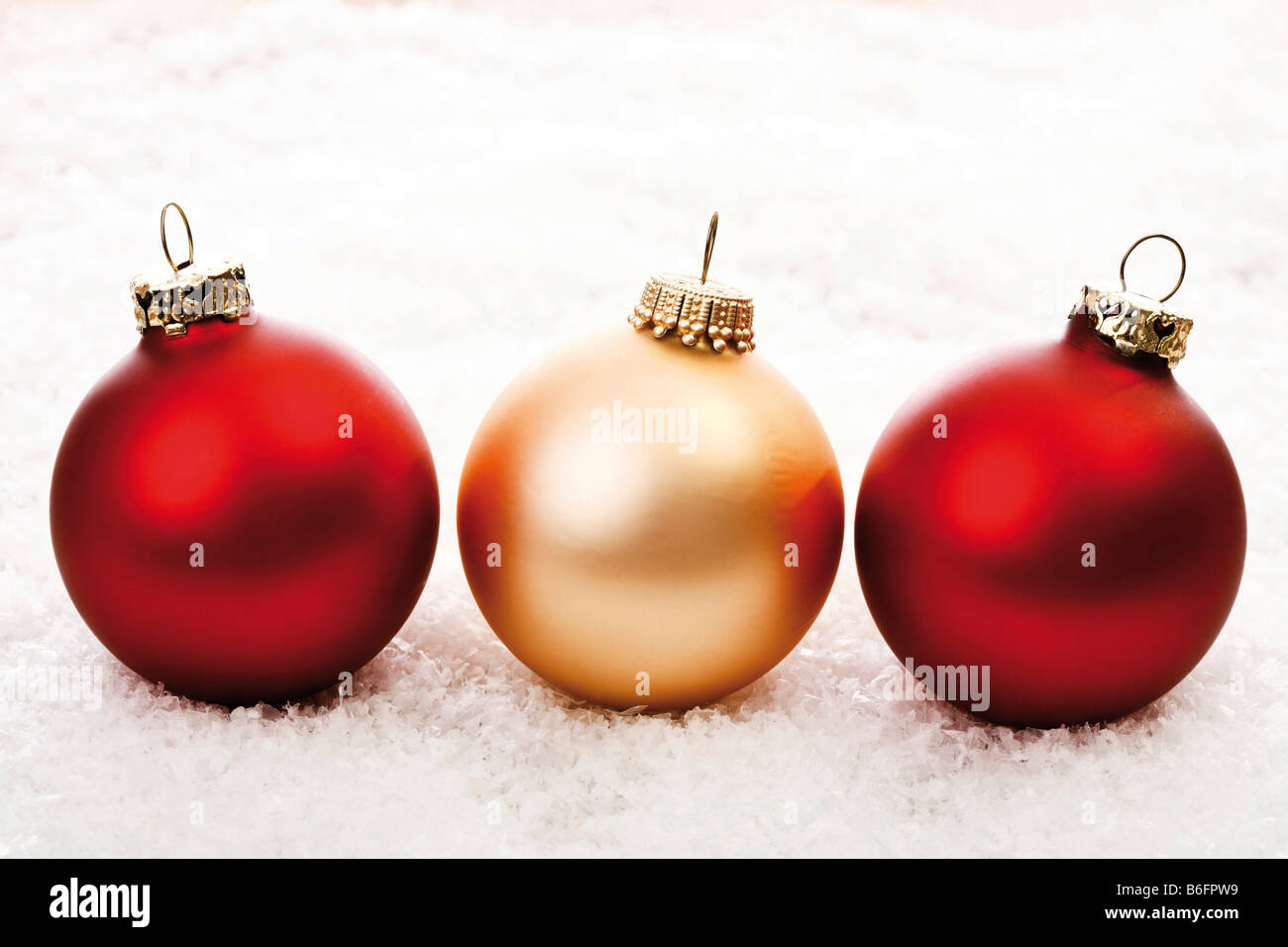 Christmas ball ornaments in the snow Stock Photo