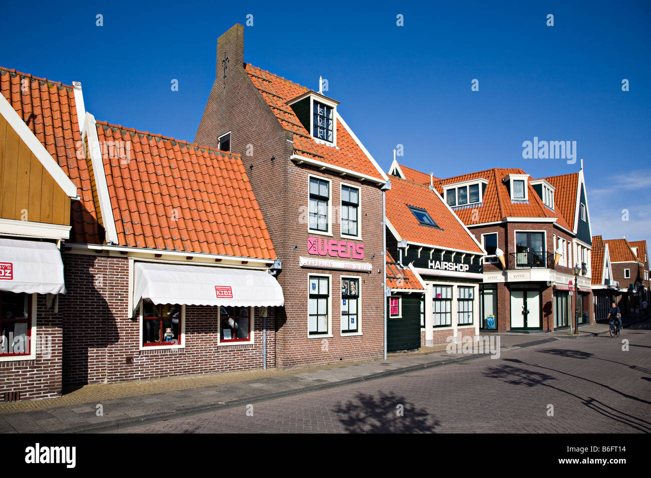 Modern built shops in traditional design with steep sloping roofs Volendam Netherlands Stock Photo
