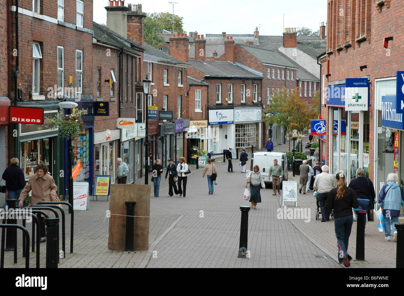 Typical small English town street scene. A pedestrianised street with shops and pedestrians in Congleton, Cheshire, England. Stock Photo