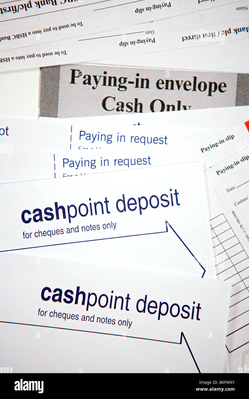 A selection of bank paying-in slips and envelopes. Stock Photo