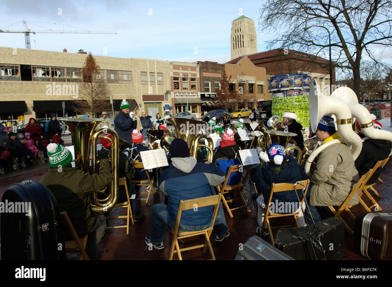 Band playing Christmas music on a streetcorner in Ann Arbor Michigan USA Stock Photo