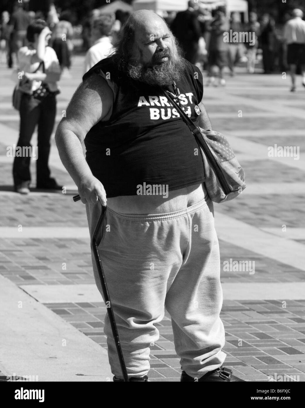 Man with 'Arrest Bush' t-shirt attends Recreate68 Rally during Democratic National Convention in Denver, Colorado Stock Photo