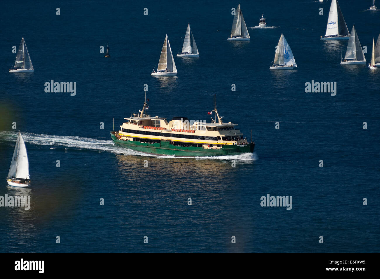 Yachts and a Manly Ferry on Sydney Harbour Stock Photo