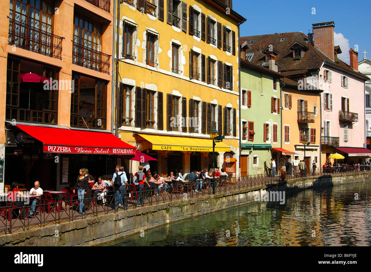 Bars and restaurants along the Thiou canal in the old town of Annecy, Haute Savoie France Stock