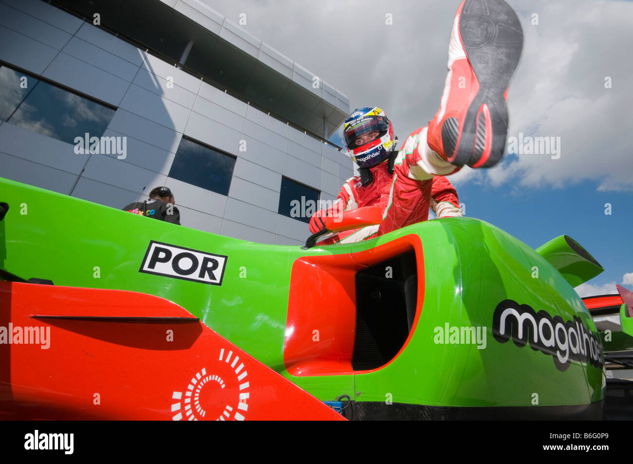 Driver Filipe Albuquerque of A1 Team Portugal exits his car after qualifying session at A1GP World Cup of Motorsport Stock Photo
