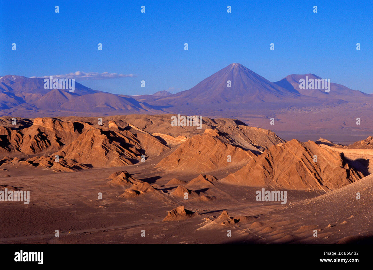 Valle de la Luna and the Licancabur volcano Atacama desert Chile Stock Photo