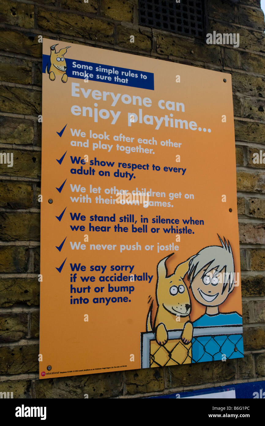 Poster in School Playground advising children how to enjoy play time Stock Photo