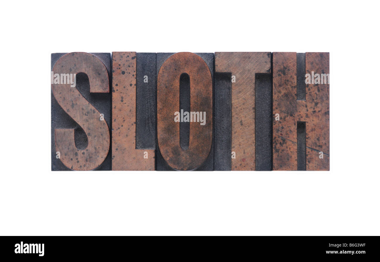 the word 'sloth' in old ink-stained wood type Stock Photo
