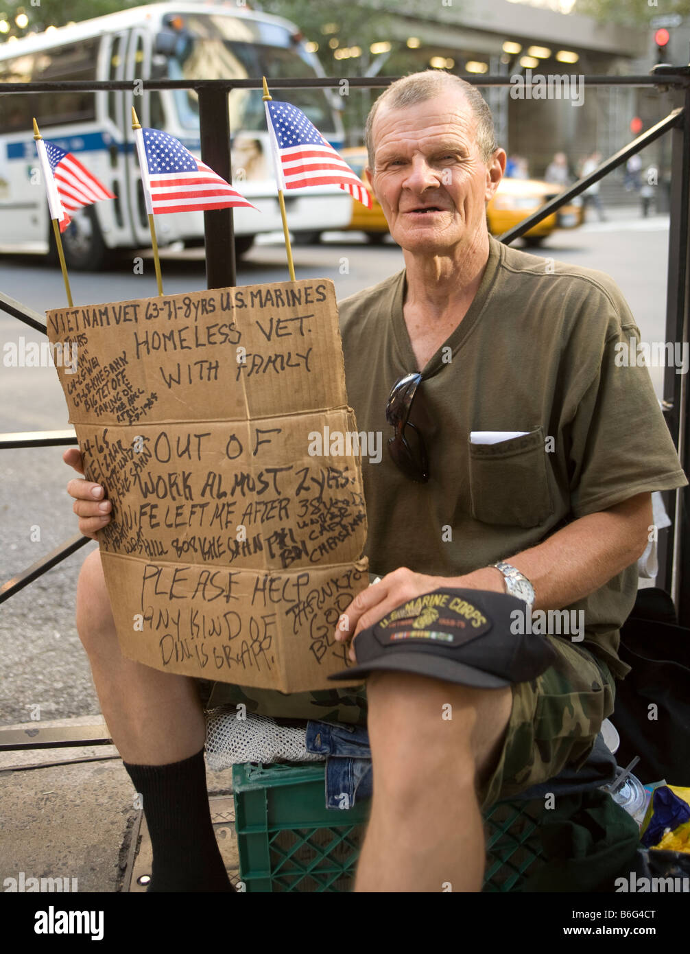 Vietnam war veteran casualty begs for money on 5th Avenue at Rockefeller Center in NYC in 2008 Stock Photo