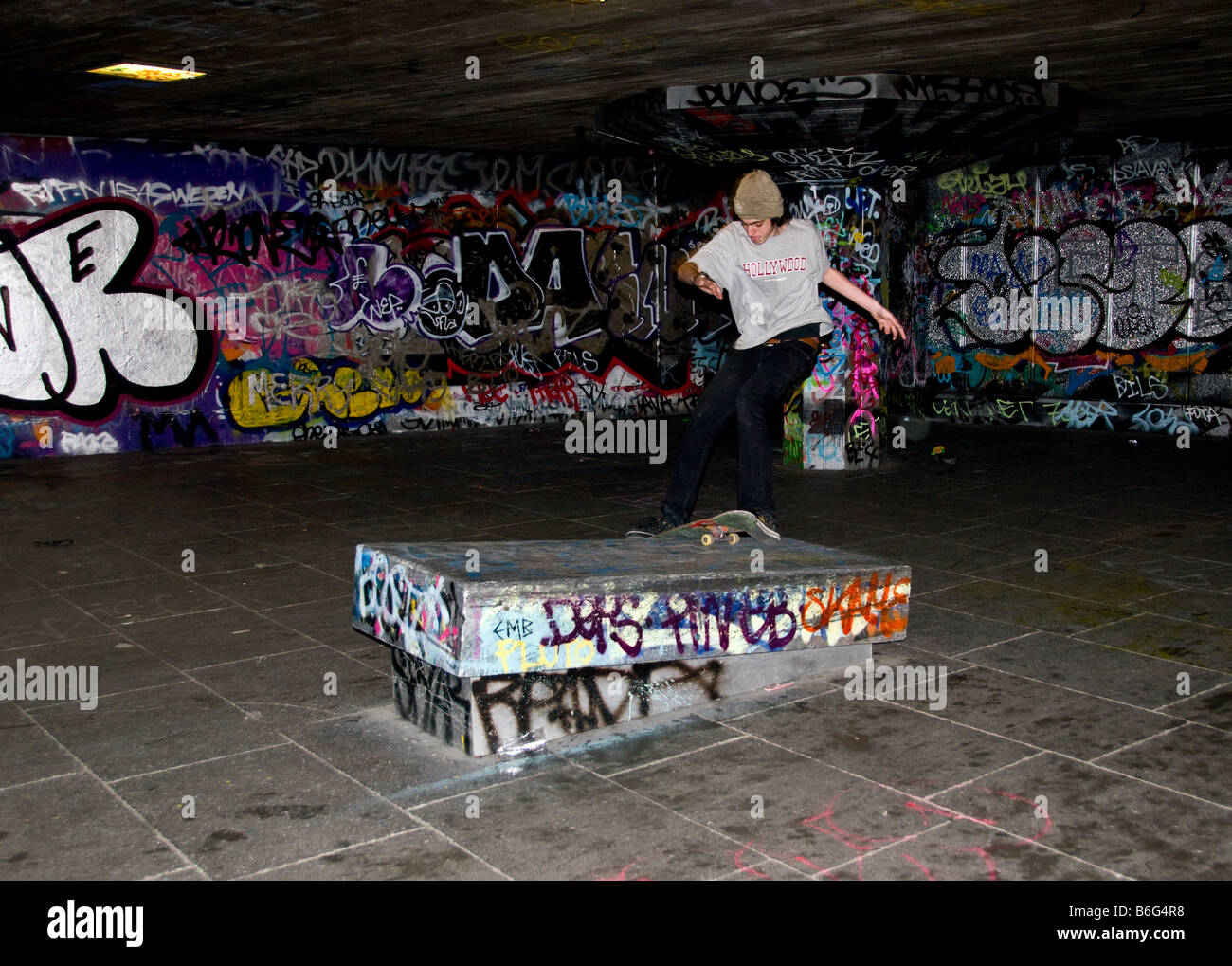 Skateboarder in the South Bank skateboard park in London Stock Photo