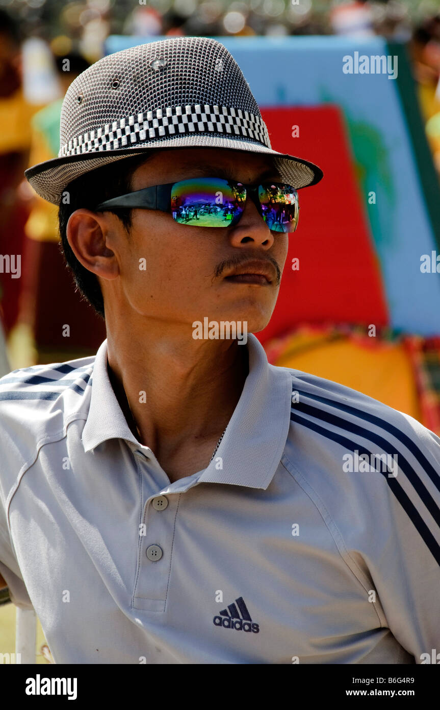 stylish man with rainbow sunglasses in Bangkok Thailand Stock Photo